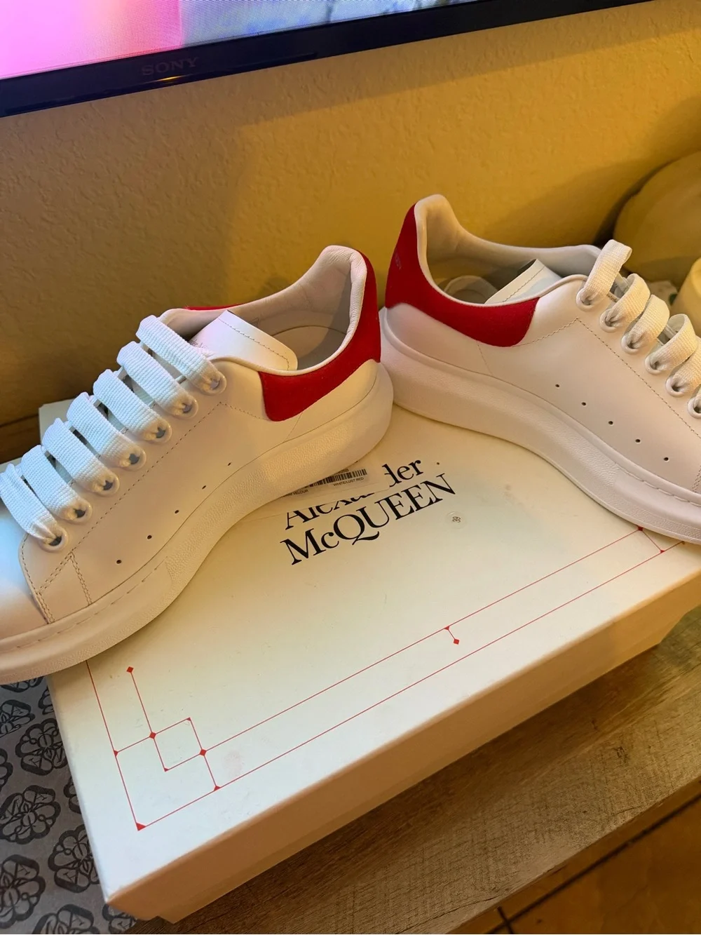 Alexander McQueen White Sneakers with Red Heel Tab